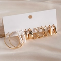 Dettaglio di un set di 6 paia di orecchini dorati con cerchi e perle finte - Perno in Argento - Oro (Set da 12 pezzi)
