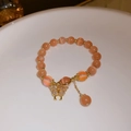Peach cat eye stone beaded bracelet with a gold butterfly pendant and zircon detail - Peach Pink Cat Eye Pave Butterfly Bracelet (47# Bracelet - Orange - Butterfly)