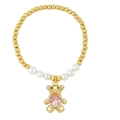 Elegante pulsera de perlas y cuentas doradas con colgante de oso y un corazón rosa - Rosa