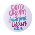 White round motivational badge with blue and pink lettering for sports and training - DONT DREAM OF WINNING