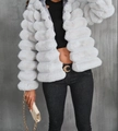 Detail shot of light grey faux fur jacket showing the horizontal layered texture design - S / Gray