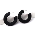 Matte black C-shaped hoop earrings with S925 silver needle on white geometry - Black