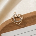 Golden double heart pendant with sparkling rhinestones on elegant satin and wood - Infinite Love Heart
