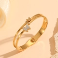 Close-up of golden double-layer butterfly bangle with sparkling crystal inlay details - Double Row Butterfly with Diamonds (H716)