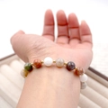 Multicolor beaded bracelet with gold spacers and marble texture beads on wrist - 8mm Beaded Bracelet
