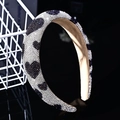 Macro detail of high-volume sponge headband with sparkling black and white rhinestones - Black & White Rhinestone Heart