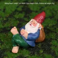 Relaxing sitting garden gnome with red hat and blue shirt, resin statue 7cm long - Lying Gnome
