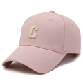 Breathable pink cotton baseball cap featuring beige embroidered C letter and curved brim - Pink