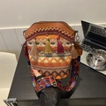 Bohemian bucket bag with orange tassels and wide geometric strap in ethnic style - Dark Brown