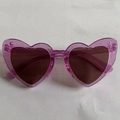 Pink glitter heart-shaped sunglasses with dark UV400 lenses and translucent frames - Glitter Purple