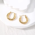 Detailed macro view of golden bamboo textured hoop earrings with secure pin clasp closure - Three Section Bamboo