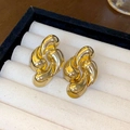 Elegant gold-tone twisted teardrop metal earrings displayed on a black velvet jewelry box - 36# Twisted Water Drop Streamlined (36# Steel Post-Gold)
