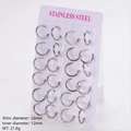 Set of 1.6mm silver stainless steel hoop earrings on a white display card - 12mm / Steel