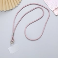 Detailed view of luxury pink rhinestone phone lanyard with silver metal clip and clear tab - Pink