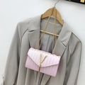 Pink woven crossbody bag featuring golden chain strap and V-shape fringe buckle - Pink