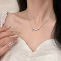 Elegant silver bow pendant necklace with shiny zircons on a delicate chain for women - Silver Sparkling Rhinestone Row Necklace (XL1878)