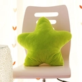 Star-shaped plush throw pillow in vibrant green soft fabric on a white chair - Green Five-point Star