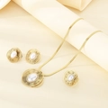 Detail of gold-plated jewelry set featuring pearl necklace, hollow earrings and ring - Hollow Round Pearl Style (KS225375-LX)