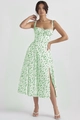 Close-up of the elegant green floral print fabric and side slit on this summer midi dress - S / Tops / White with Light Green Leaves
