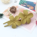 Matte mustard yellow hair clip featuring dual flowers in a retro minimalist U-shape style - Fruit Green
