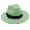 Close-up of mint green vintage fedora hat with black ribbon and felt texture details - Green
