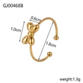 Dettaglio anello dorato con fiocco, dimensioni 1.0cm per 0.6cm e un peso di 1.3g - Stile Fiocco Oro (GJ00468B)