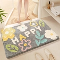 Graue Badematte mit bunten Blumen, Happy-Schriftzug und rutschfester Unterseite - Glücksnüsse (Grau) / 50*80cm