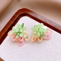 Detail of green flower earrings with beaded tassels and pearls on a wooden tray - 3# Flower Petal Tassel Style / Green