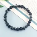 Elastic beaded bracelet with black lava rock and polished onyx beads for unisex style - Lava & Onyx & Labradorite