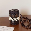 Detail of bohemian handmade coconut shell mini bag with cylindrical woven texture and beads - Brown White Cylindrical Style (AQ367)