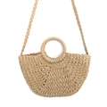 Detail view of woven paper straw bag with round handles and braided shoulder strap - Integrated Strap Style / Medium / Light Coffee