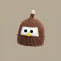 Brown knitted baby owl hat with big eye patches and ear flaps for winter warmth - Bird Hat Khaki (2 Months - 2 Years Old)