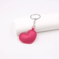 Detailed close-up of a pink heart-shaped PU leather keychain with silver metal ring - Rose Red