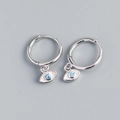 Silver geometric eye drop earrings with a central blue sapphire-style stone inlay - 925 Silver / White Gold