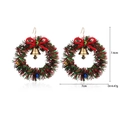 Detail view of Christmas wreath earrings with dimensions 7.4cm by 7cm on white background - Red Green Wreath Earrings