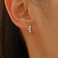 Three-stone silver hoop earrings with clear round zircons in a minimalist luxury style - White Gold Style (S111)