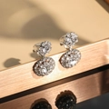 Sparkling silver rhinestone snowflake ear clips with double disc pendant design - Clip-on Style (No Piercing)