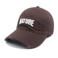 Detail of vintage brown baseball cap with white NATURE embroidery and distressed brim edge - M (56-58cm) / Coffee