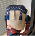 Woven straw bucket bag in beige and blue with ethnic style geometric shoulder strap - One Size / Dark Blue