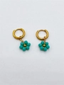 Gold hoop earrings with turquoise beaded flower charms and polished finish - Pine Green