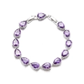 Detail shot of silver bridal bracelet featuring twelve purple pear-cut cubic zirconia stones - Purple