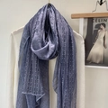 Detailed view of the delicate lace trim on a light blue linen cotton shawl for women - Blue