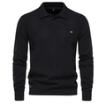 Gros plan détaillé d'un pull polo noir en maille avec motif losange et col boutonné - S / Noir
