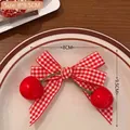 Red and white checkered bow hair clip with cherry charms and 8cm width measurement - Plaid Bow Cherry Hair Clip 1Pc