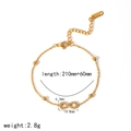 Detail view of gold infinity bracelet with dimensions 210mm plus 60mm and S.Steel stamp - Gold Infinity Zirconia Bead Anklet (TA5086)