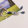 Hamsa-Hand-Schlüsselanhänger im Ethno-Stil mit blauen Evil-Eye-Perlen und Band - Hamsa Hand 2
