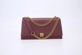 Burgundy quilted envelope crossbody bag with gold chain strap and square buckle - Red
