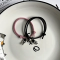 Bracciali magnetici per coppia con astronauta rosa e nero e chiusura a cuore nel piatto - Nero e Rosa - Magnete a Cuore Argento