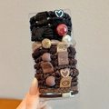 Elastic hair tie set in black and brown featuring decorative pearls and heart charms - Chocolate