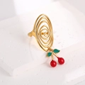 Golden spiral ring featuring vibrant red cherry pendants with green enamel leaf accents - Spiral Oval Style (J-20017)